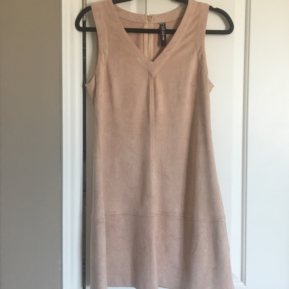 Dress with gold accent zip.